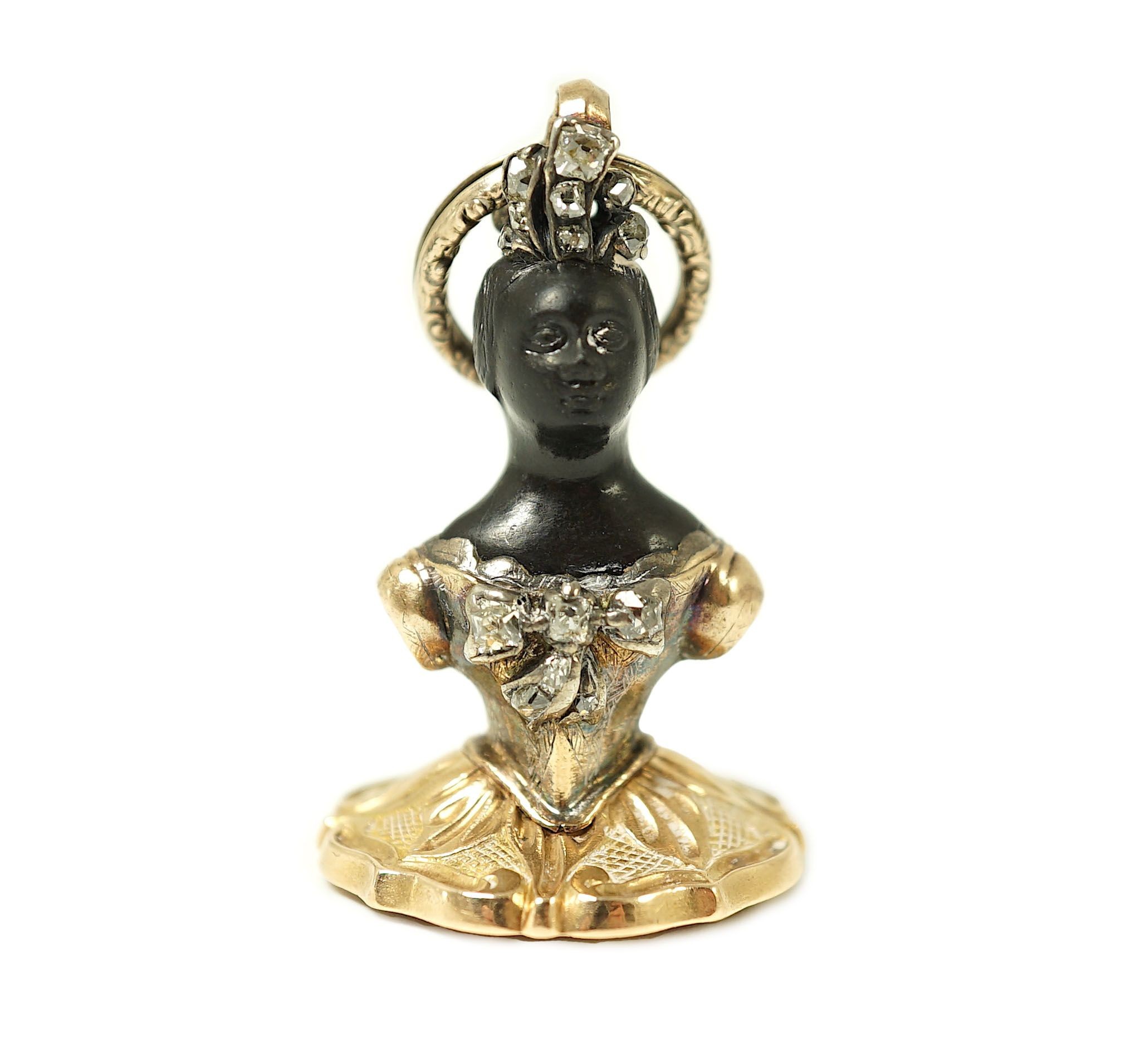 A 19th century gold overlaid, emerald and diamond set double sided Blackamoor seal pendant